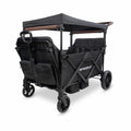 WONDERFOLD X4R Rev Stroller Wagon (4 Seater) - Collapsible Stroller Wagon with 5-Point Seatbelt Harnesses, Reclining Seats & Footwells, Black