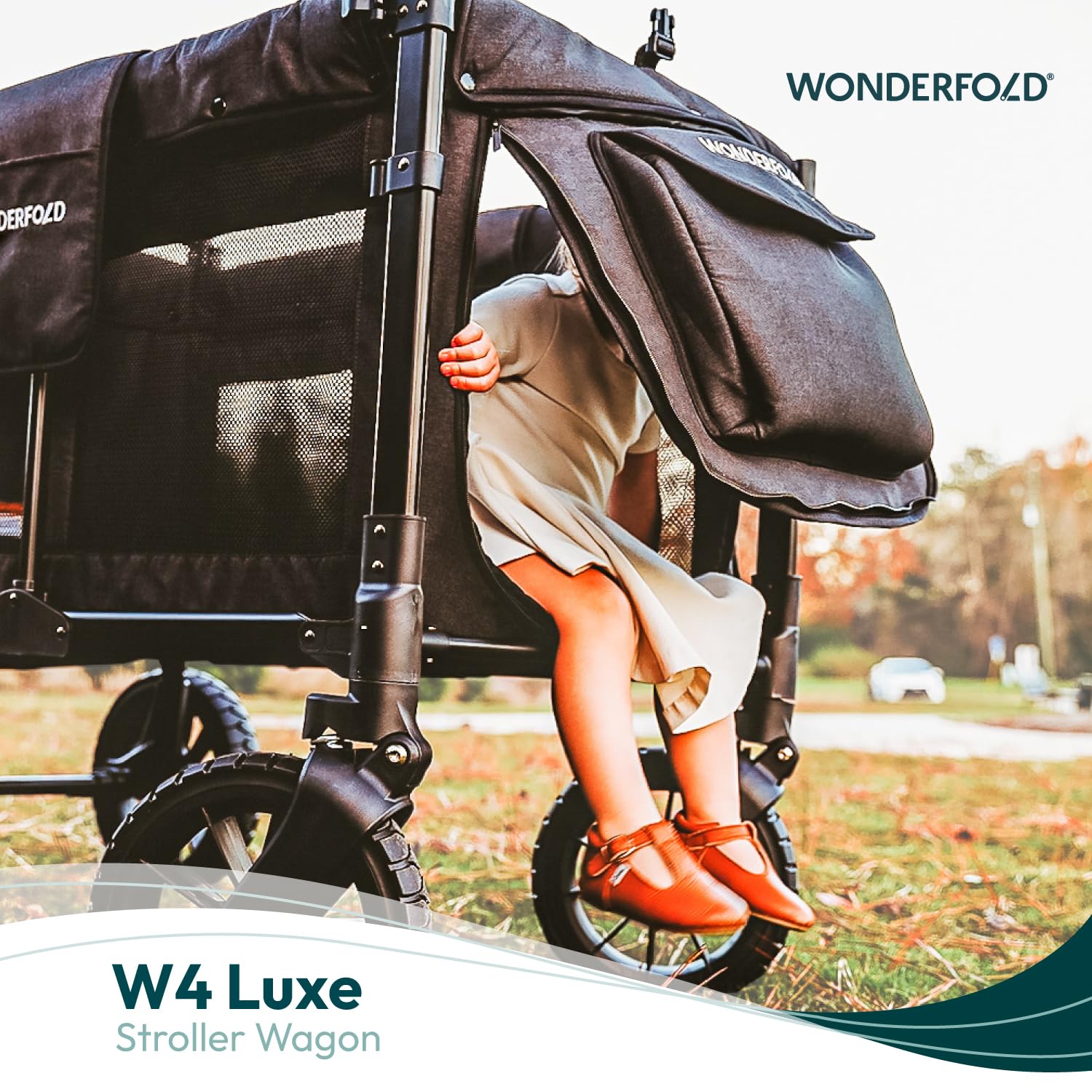 WonderFold W4 Luxe Stroller Wagon - Collapsible Stroller Wagon with Steel Frame - Adjustable Canopy & Push Handle - XL All-Terrain Wheels - for Babies, Toddlers & Kids - 4 Seater - Black